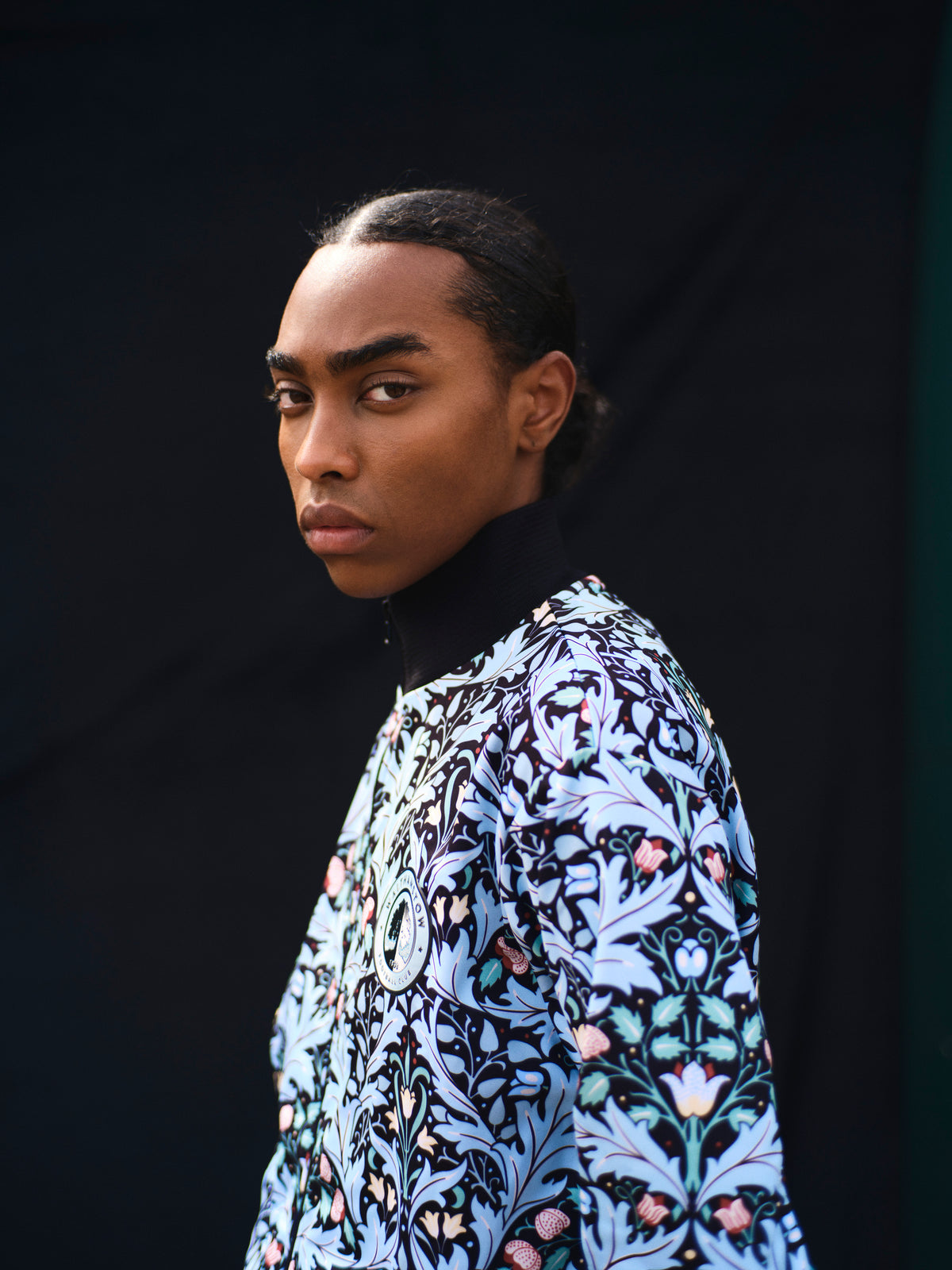 Walthamstow FC player wearing the walk out jacket