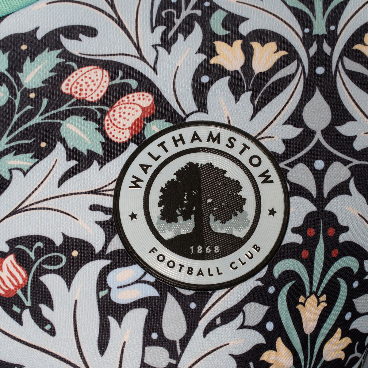 Close-up of the Walthamstow FC club crest on the away shirt