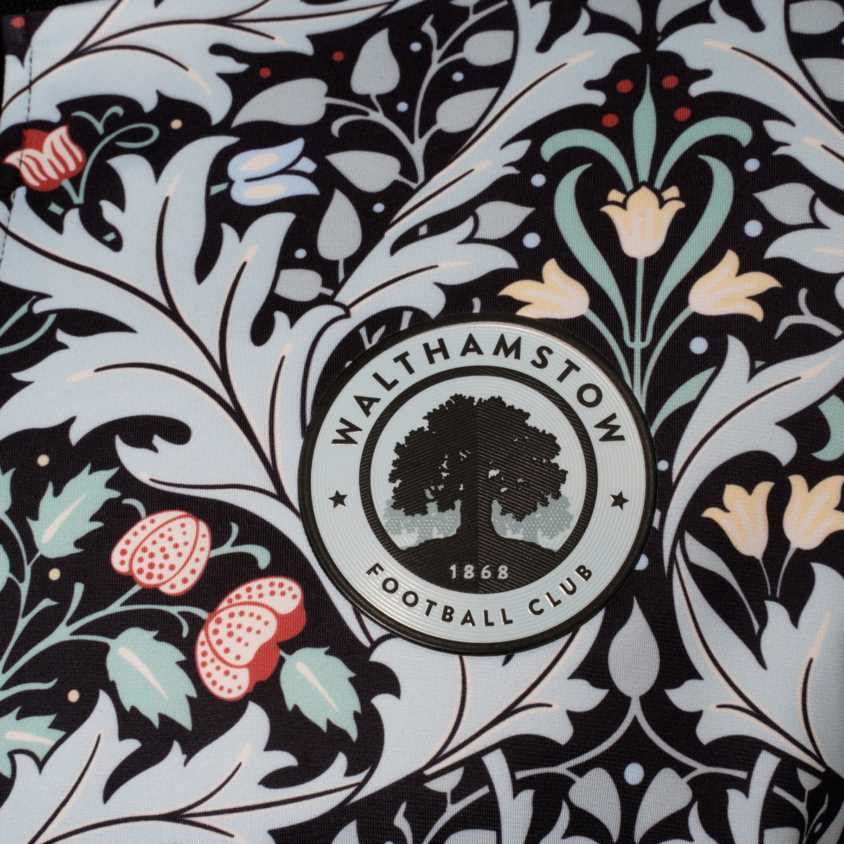 Close-up of the Walthamstow FC club crest on the walk out jacket